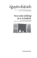 two-cats-sitting-at-a-window-3